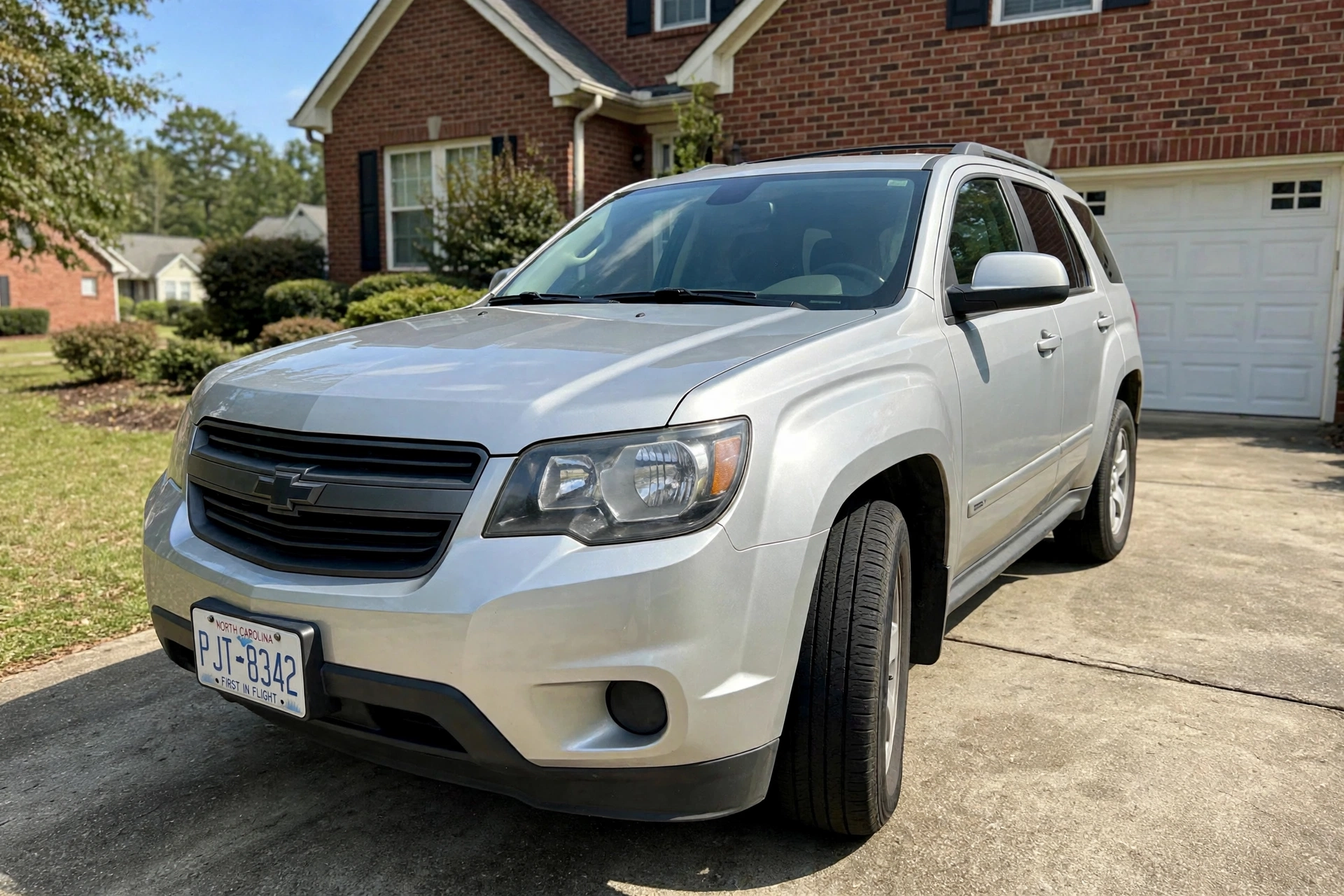 Silver SUV after detailing with glossy shine — illustrative example
