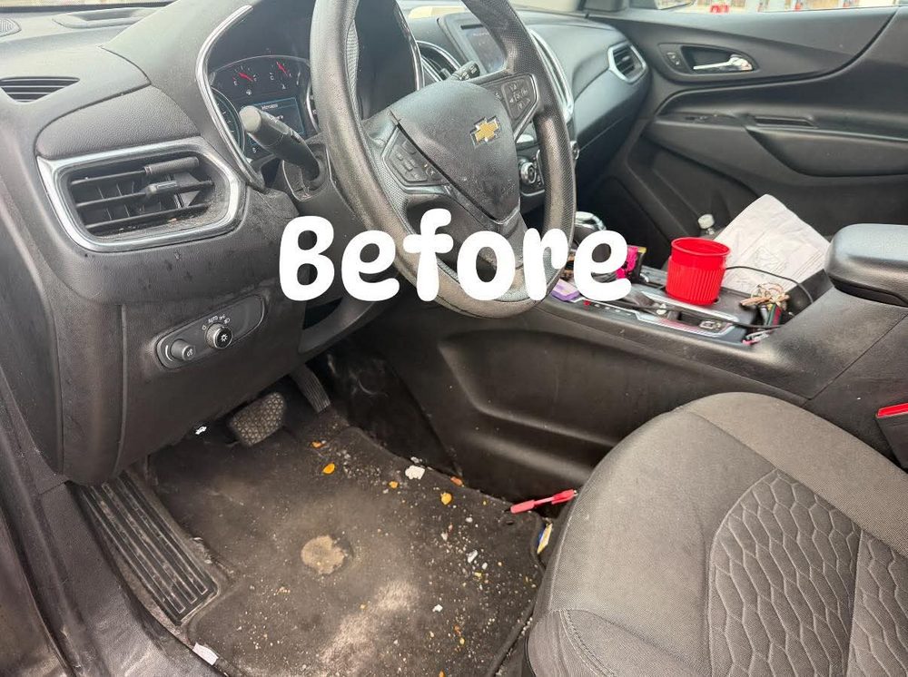 Car interior before detailing — dirty and cluttered