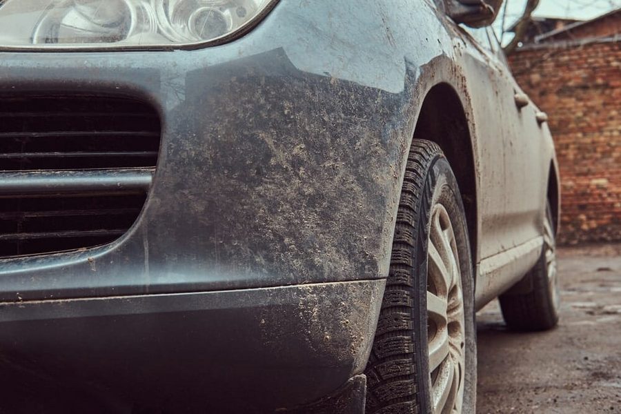 Muddy, dull car exterior before detailing
