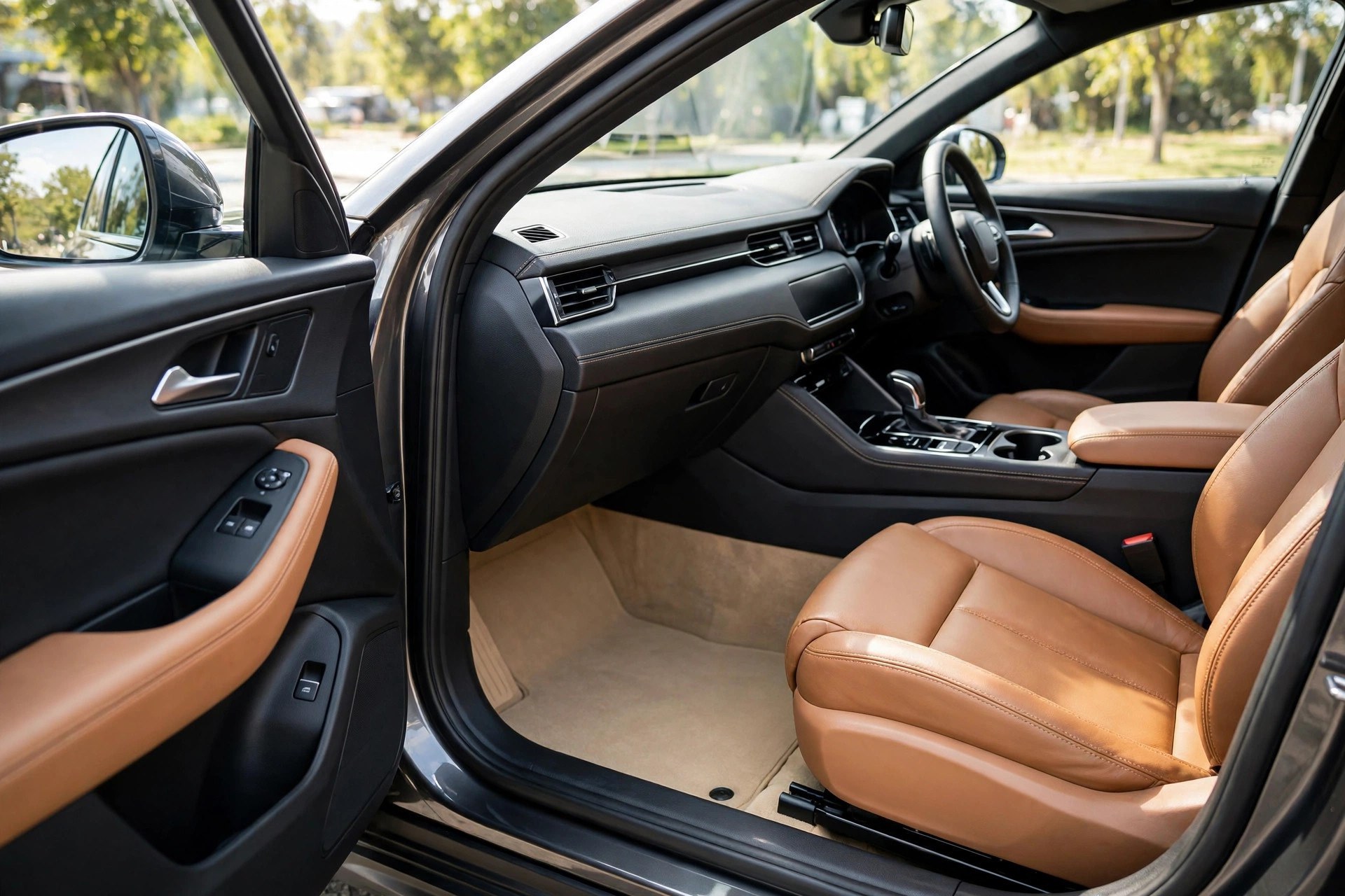 Same style car interior after detailing — spotless leather and dashboard