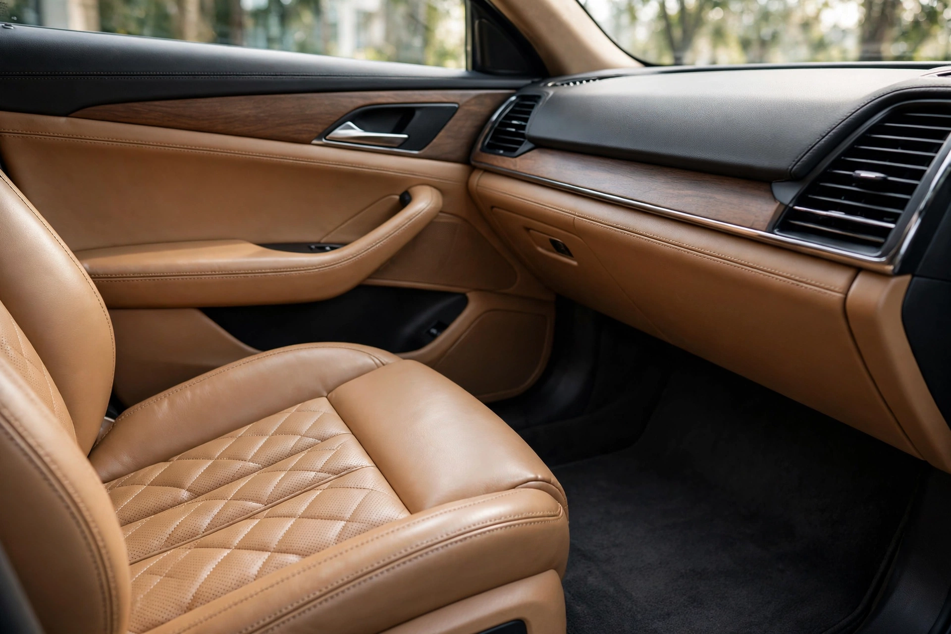 Freshly detailed luxury car interior with conditioned leather seats